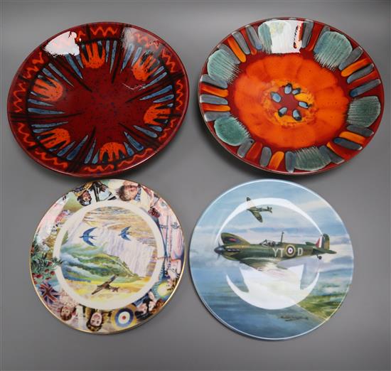 Two Poole Pottery wall chargers, Exodus and Volcano and two limited edition plates,